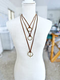 Bronze O-Ring on Brown Leather Necklace